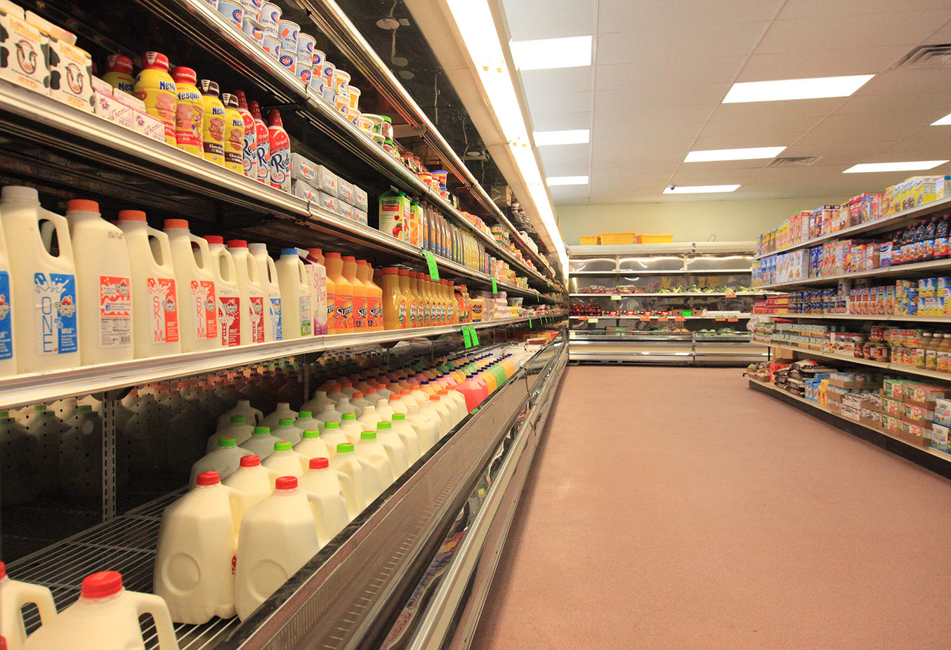 milk orange juice dairy aisle Menella's Marketplace